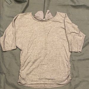 Grey U neck ruched 3 quarter sleeve shirt.